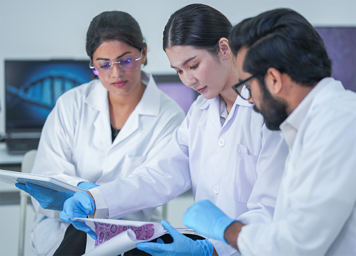 Healthcare professionals reviewing notes together.